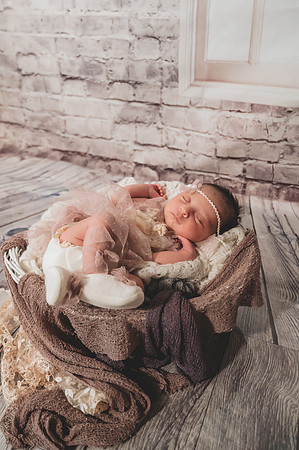 Newborn portrait at Clinton studio with eyes open.