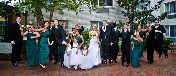 wedding guest jumping outside with bride and groom by NJ Wedding Photographer