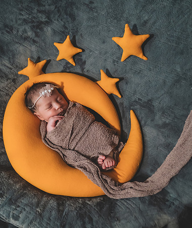Another high key black and white portrait of a newborn captured at the Clinton studio.