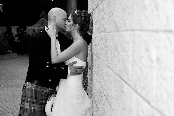 Scottish wedding bride and groom kiss by NJ Wedding Photographer