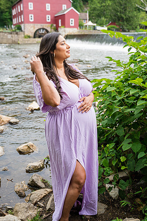 Newborn session at Clinton studio featuring two faces in profile view.