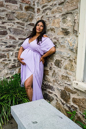 Newborn portrait at Clinton studio with a smile and eyes open.