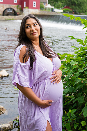 Newborn session at Clinton studio with a smiling face.